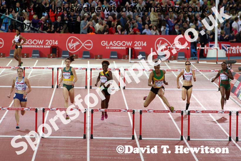 Kaliese Spencer (Jamaica) wins the 400 metres hurdles at the Commonwealth Games, Glasgow. Photo: David T. Hewitson/Sports for All Pics